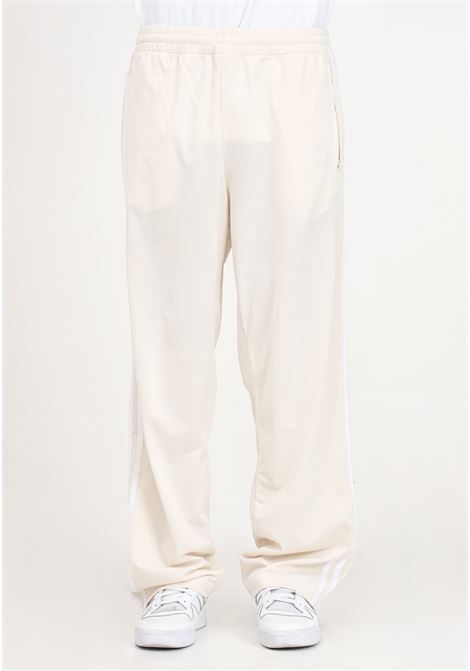 Beige Firebird Tp trousers for men ADIDAS ORIGINALS | IM9477.
